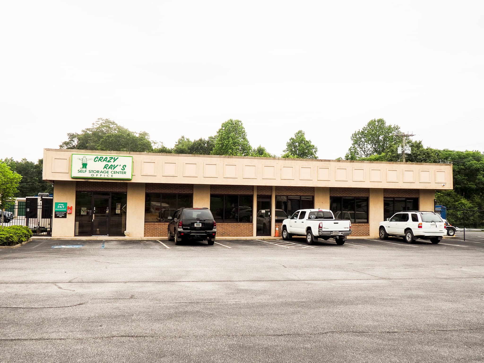 Crazy Ray's Self Storage Center office building and parking lot